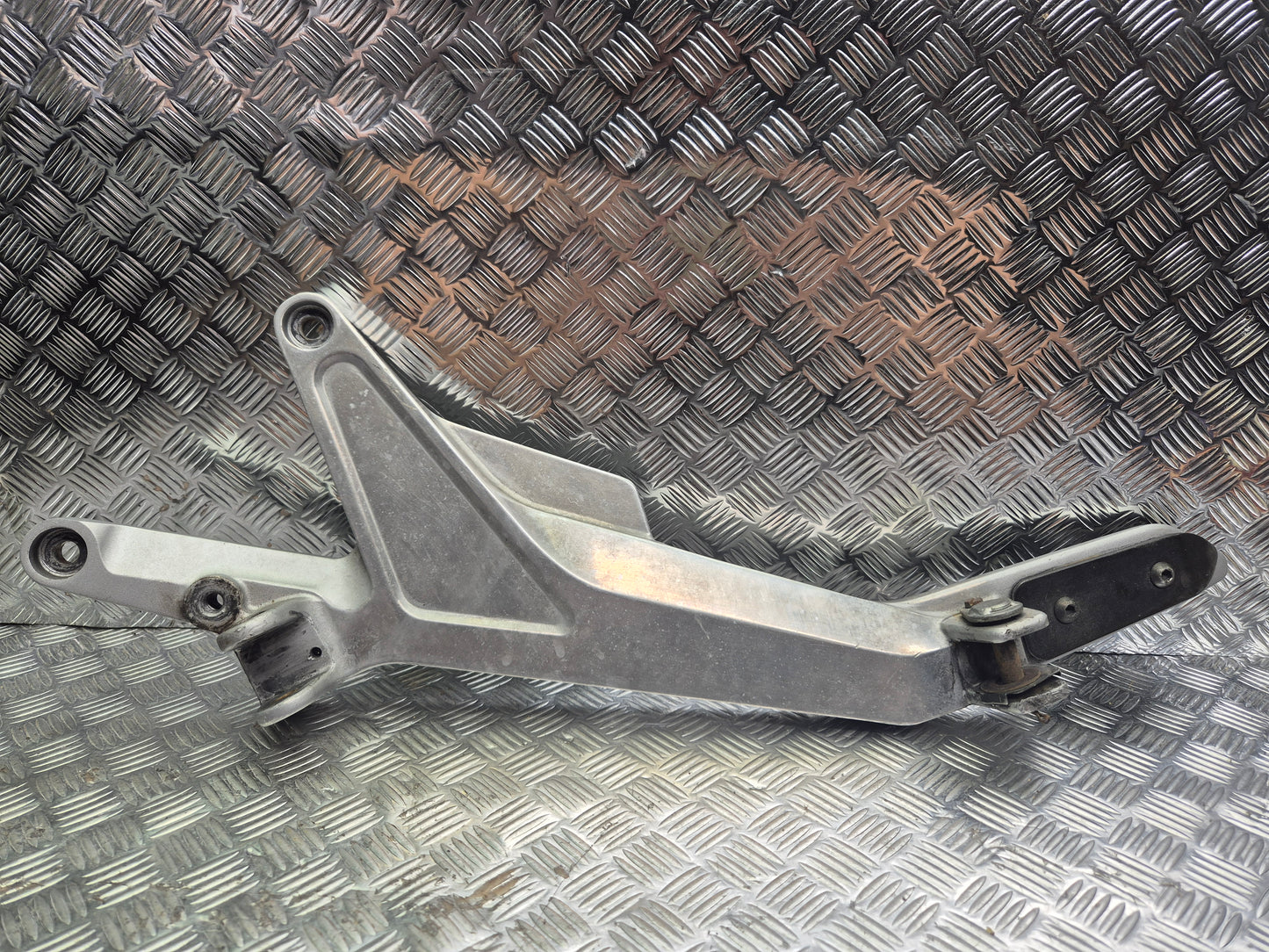 Platine Repose Pieds gauche honda 600 hornet 1998-2002